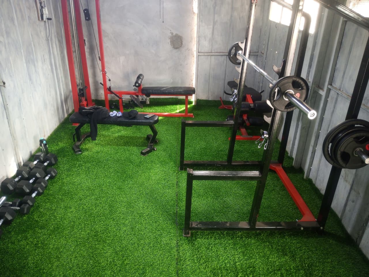TrankFit gym interior showing full rack and training floor